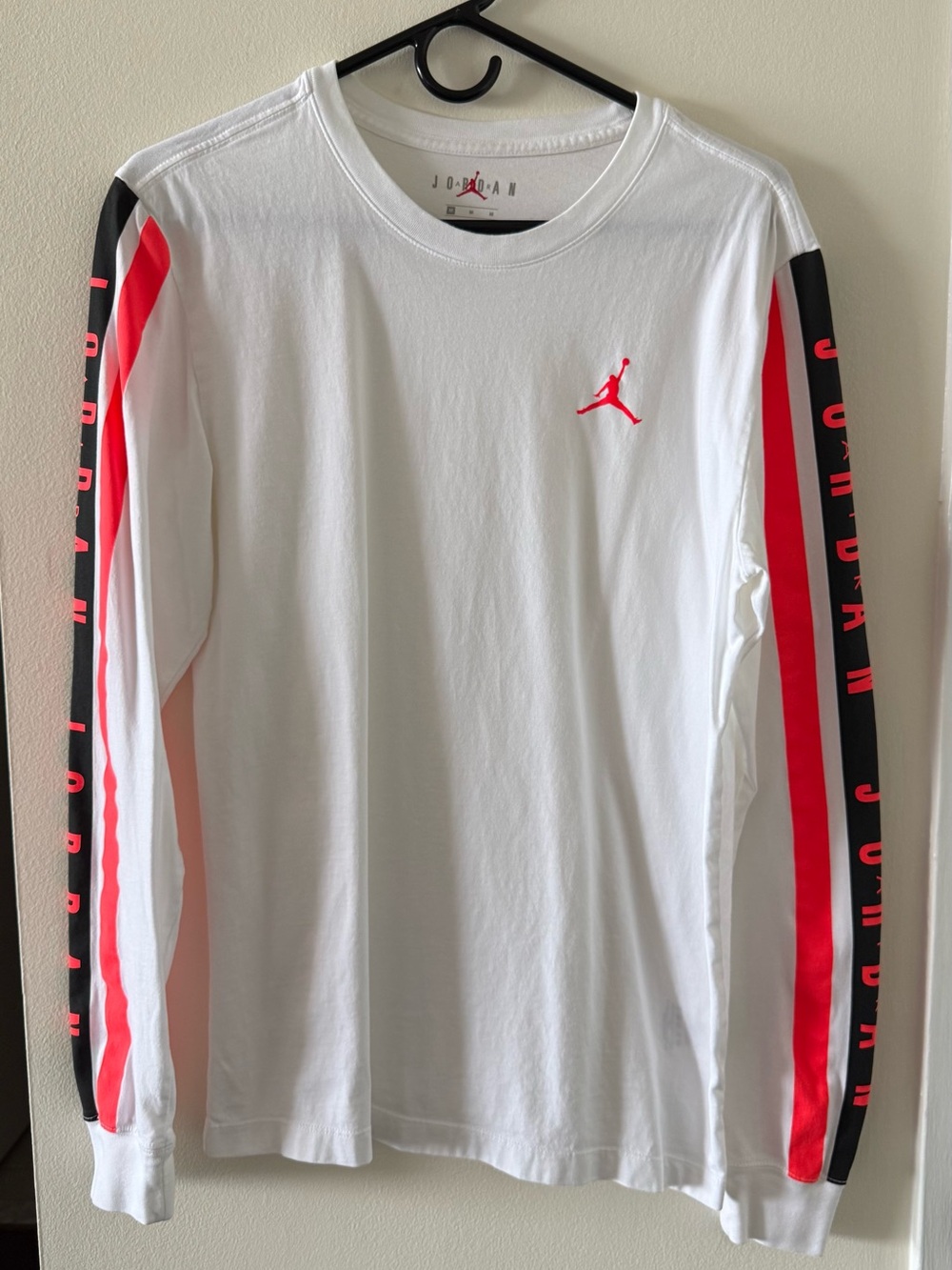 Jordan Men’s Long-Sleeve Crew Tee in White with Red and Black Sleeve Stripes
